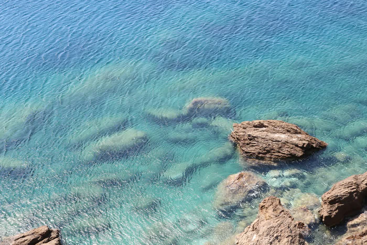 Clear water in a rocky cove